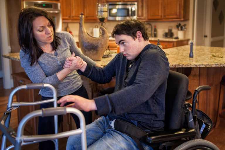 Funds from a Medicaid waiver would also pay for in-home support to assist Aaron with personal care tasks and minimize the physical demands on Diane.

"Taking care of the boys on a daily basis is beyond challenging. Emotionally it is very taxing and physically it is exhausting. The exhaustion that comes from taking care of two, full grown men in wheelchairs, is beyond words.  We live in a very small bubble because of behaviors, wheelchairs and all the other equipment that goes along with us. We have to calculate every move and can’t live spontaneously. Friends can’t have us over because most houses are not wheelchair accessible. Pat and I are very limited with what we can do. We just try to make it work the best we can with what we have."

Diane